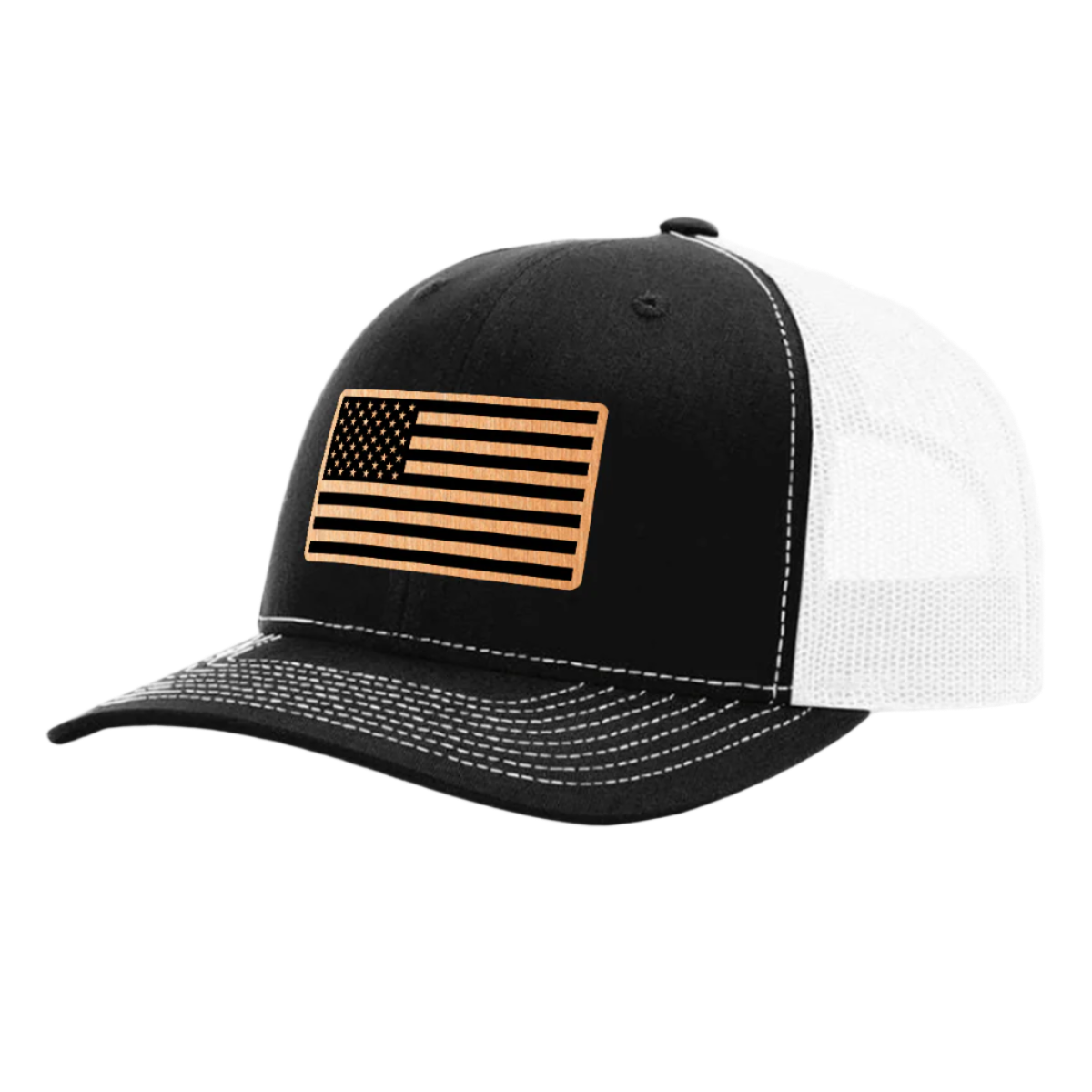 A black and white trucker hat with a brushed copper acrylic patch on the front featuring an American flag design with black accents.