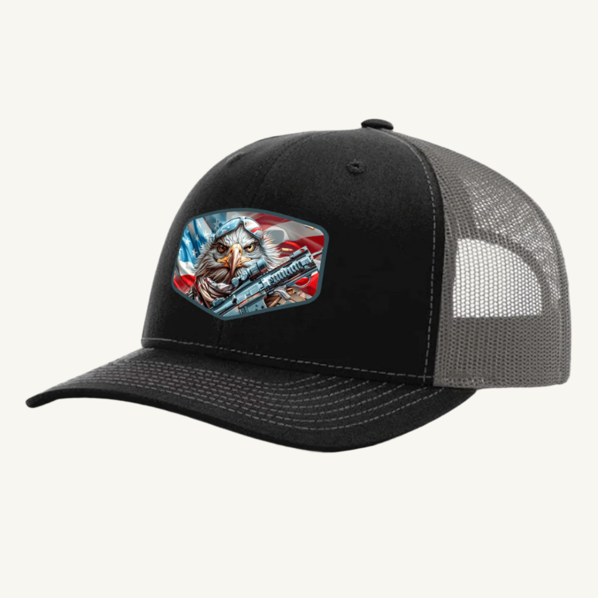 A black and charcoal mesh back hat with a leatherette patch featuring an eagle and stripes, reminiscent of the American flag.