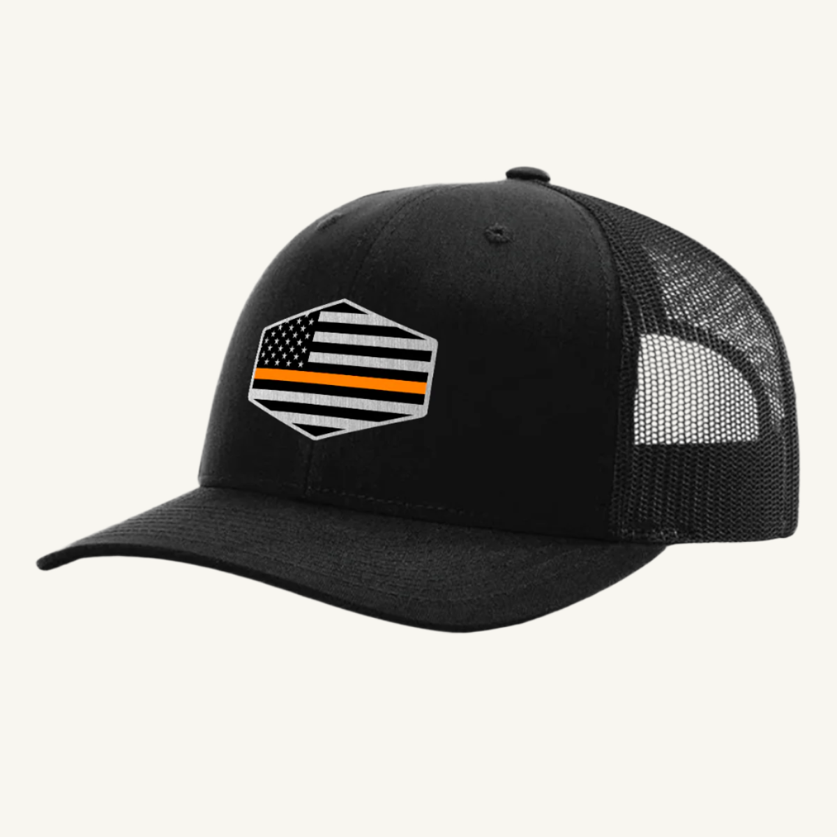 A black trucker hat with an acrylic patch on the front featuring the Thin Orange Line American Flag.