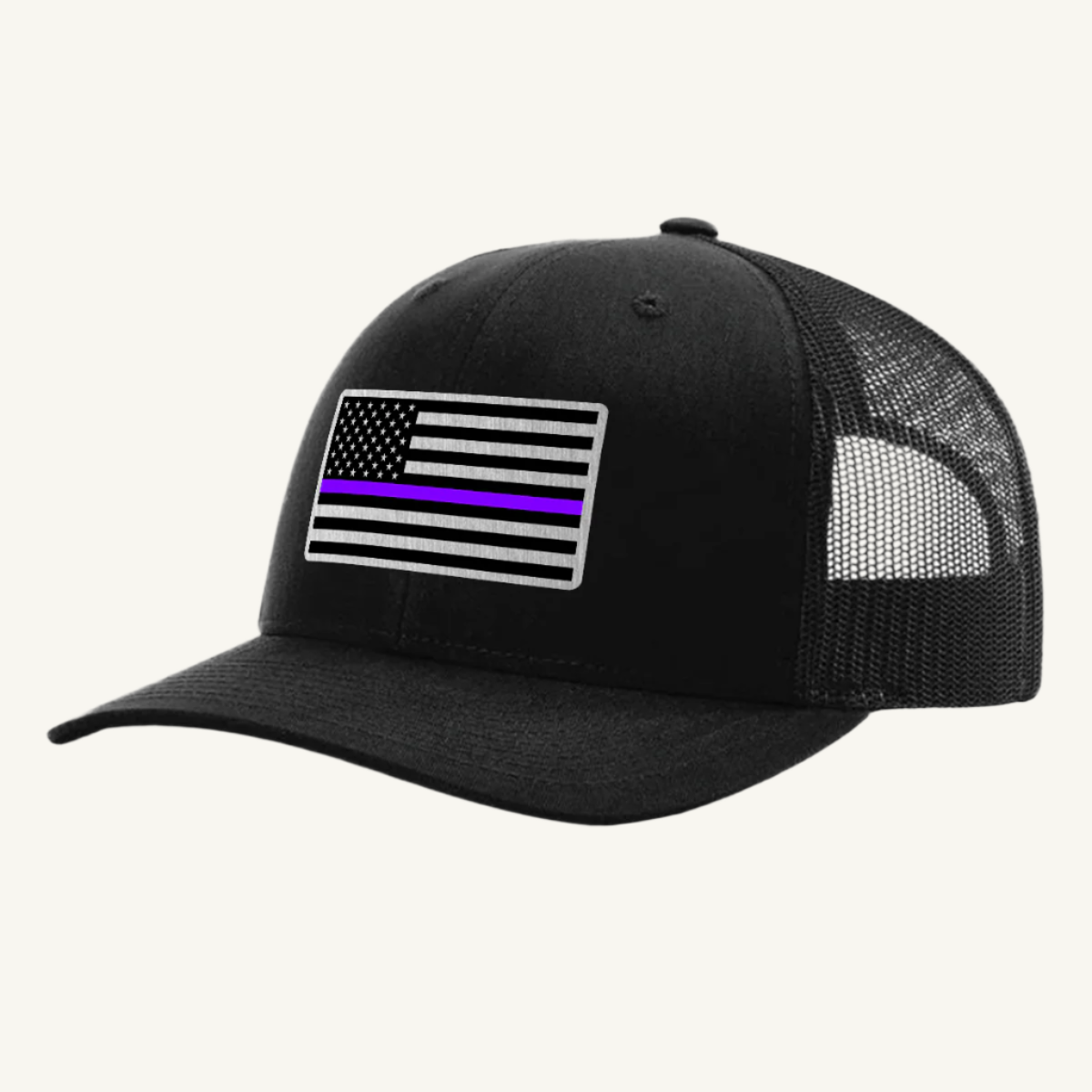 A black trucker hat with an acrylic patch on the front featuring the Thin Purple Line American Flag.